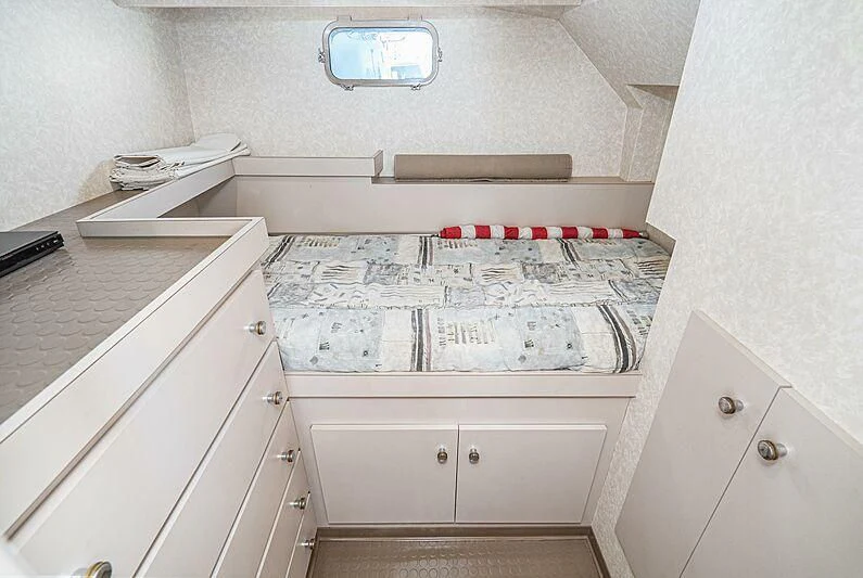 a white counter top with red and white tiles on it aboard ECHOES Yacht for Sale