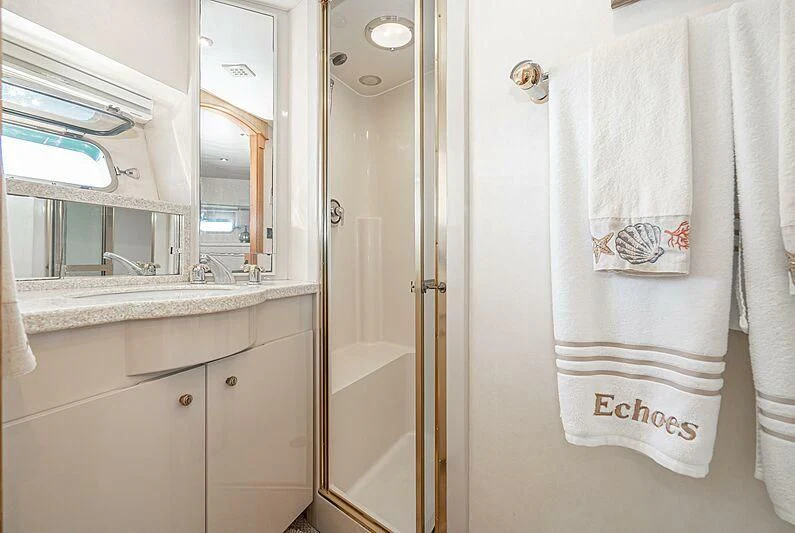a bathroom with a shower and a sink aboard ECHOES Yacht for Sale