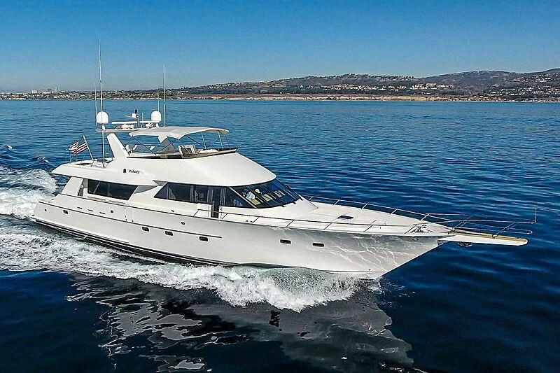 a white yacht on the water aboard ECHOES Yacht for Sale