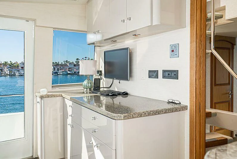 a kitchen with a large window aboard ECHOES Yacht for Sale