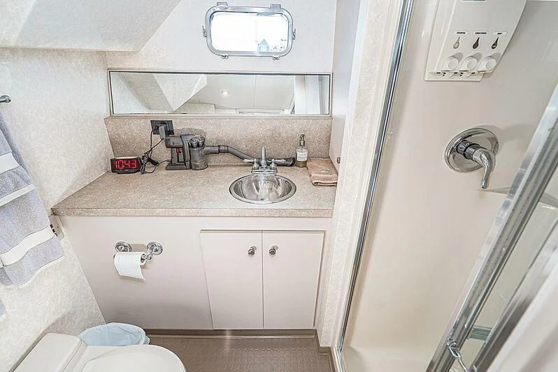 a bathroom with a sink and a mirror aboard ECHOES Yacht for Sale