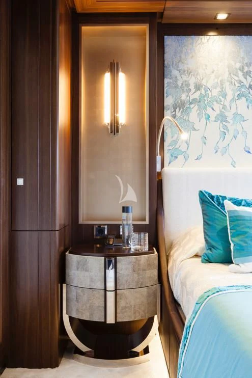 a room with a mirror and a bed aboard JULIA Yacht for Sale