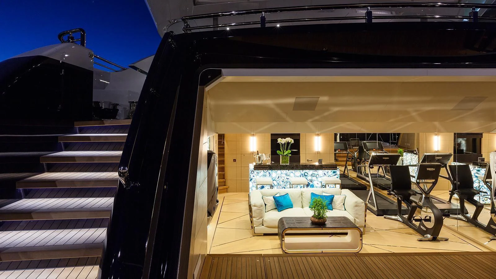 a living room with a couch and a table aboard JULIA Yacht for Sale