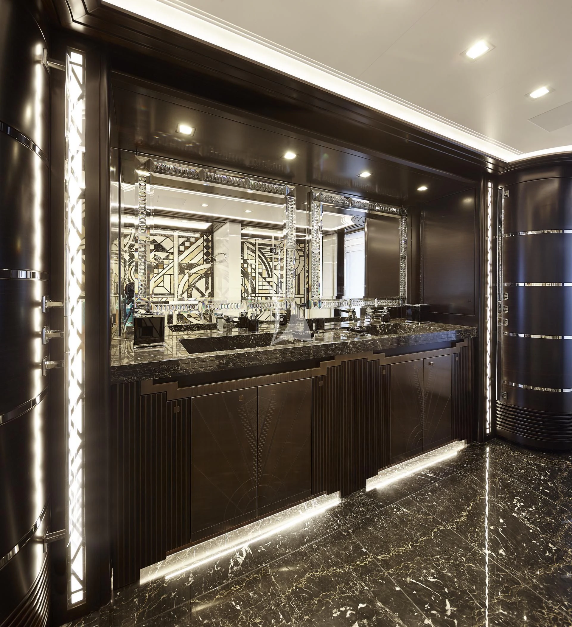 a bathroom with a large mirror aboard JULIA Yacht for Sale