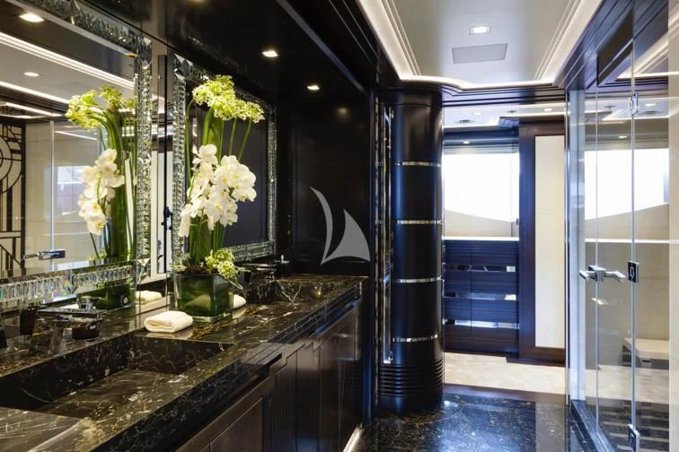 a bathroom with a countertop sinks aboard JULIA Yacht for Sale