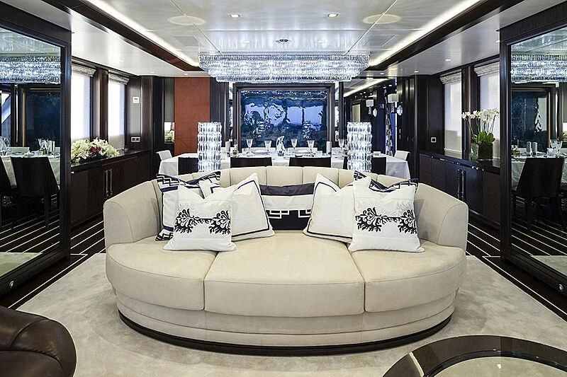 a large white couch in a room aboard JULIA Yacht for Sale