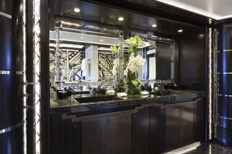 a kitchen with a large mirror aboard JULIA Yacht for Sale