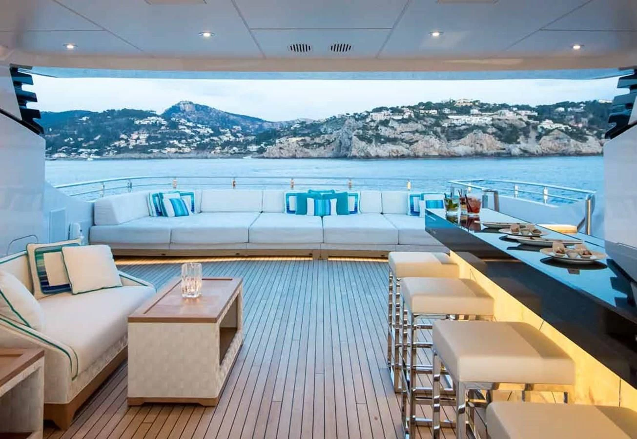 a room with a view of a mountain and water aboard JULIA Yacht for Sale