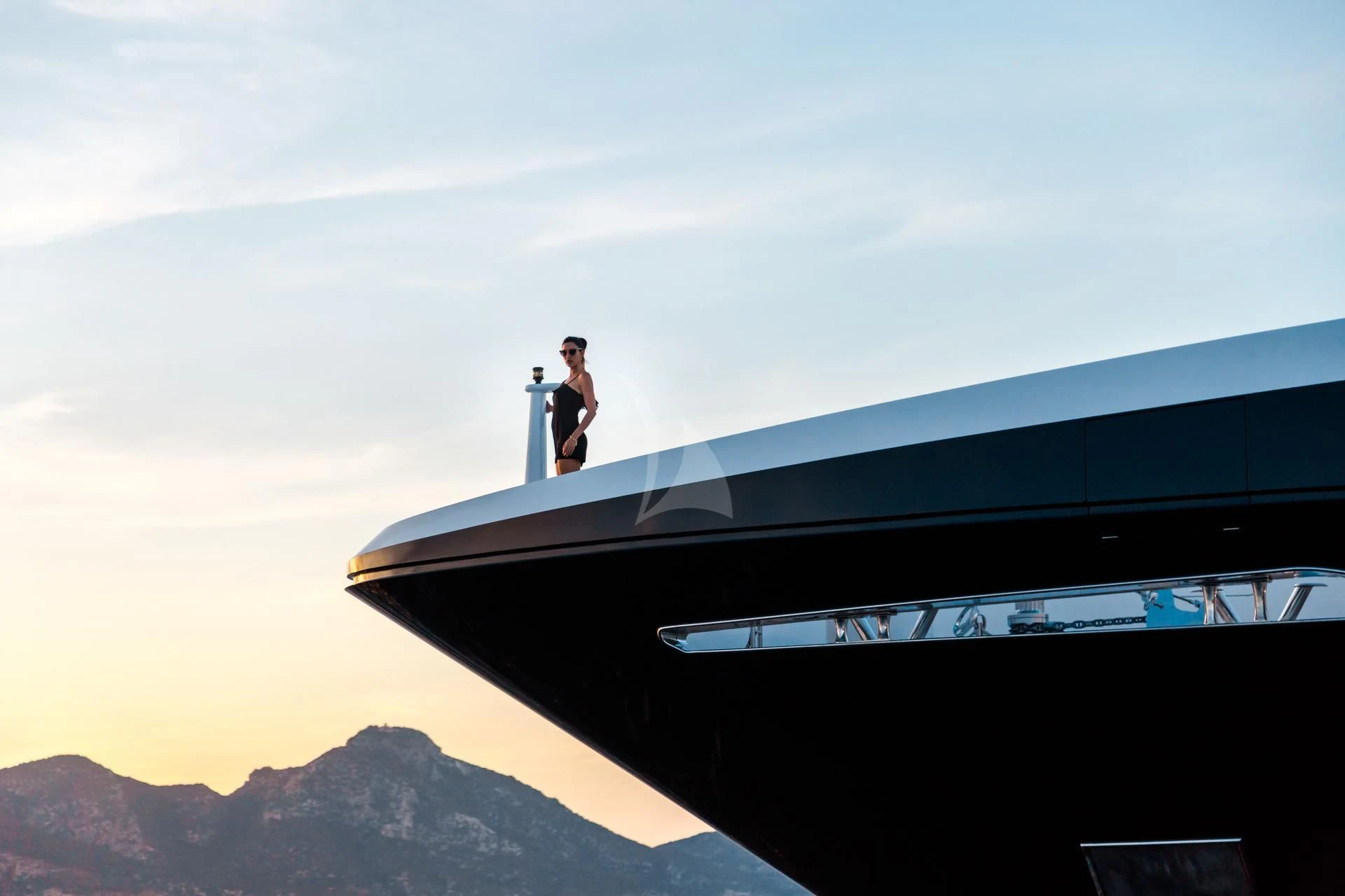 a person standing on a roof aboard JULIA Yacht for Sale