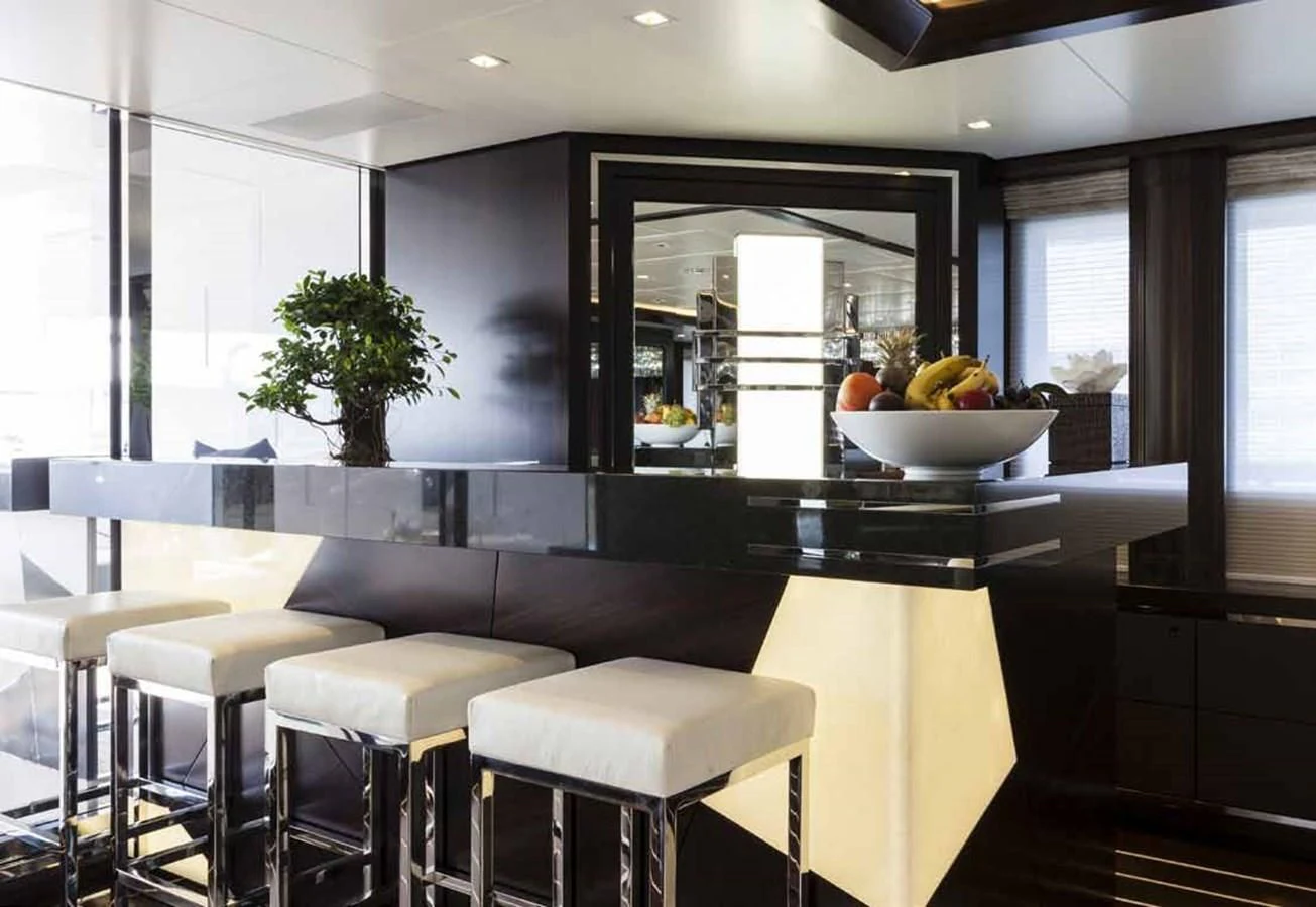 a kitchen with a large island aboard JULIA Yacht for Sale