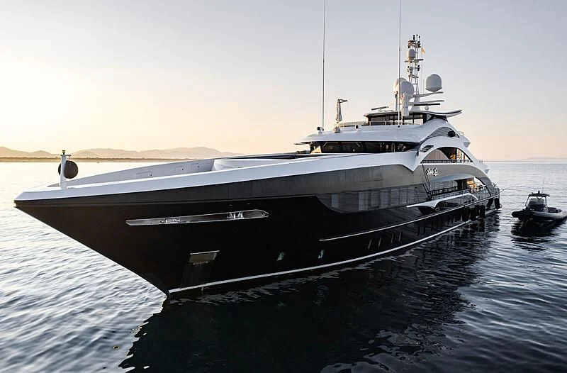 a large ship in the water aboard JULIA Yacht for Sale