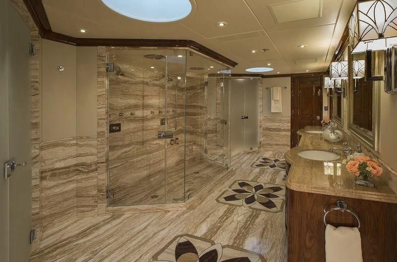 a bathroom with a large shower aboard SILVER LINING Yacht for Sale
