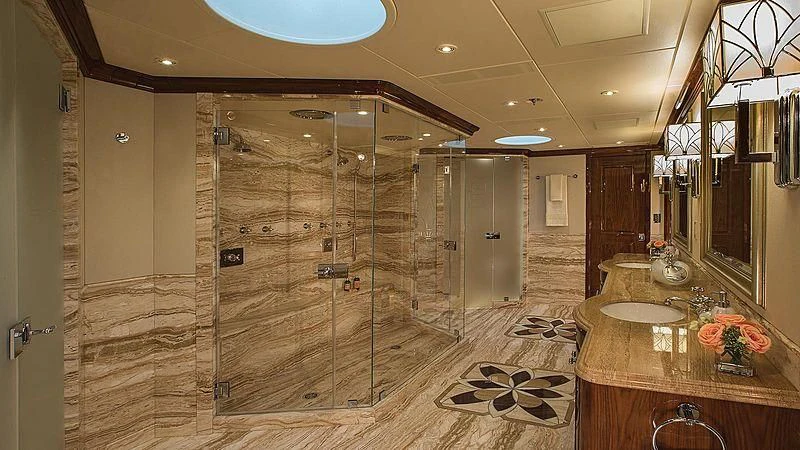 a bathroom with a marble shower aboard SILVER LINING Yacht for Sale