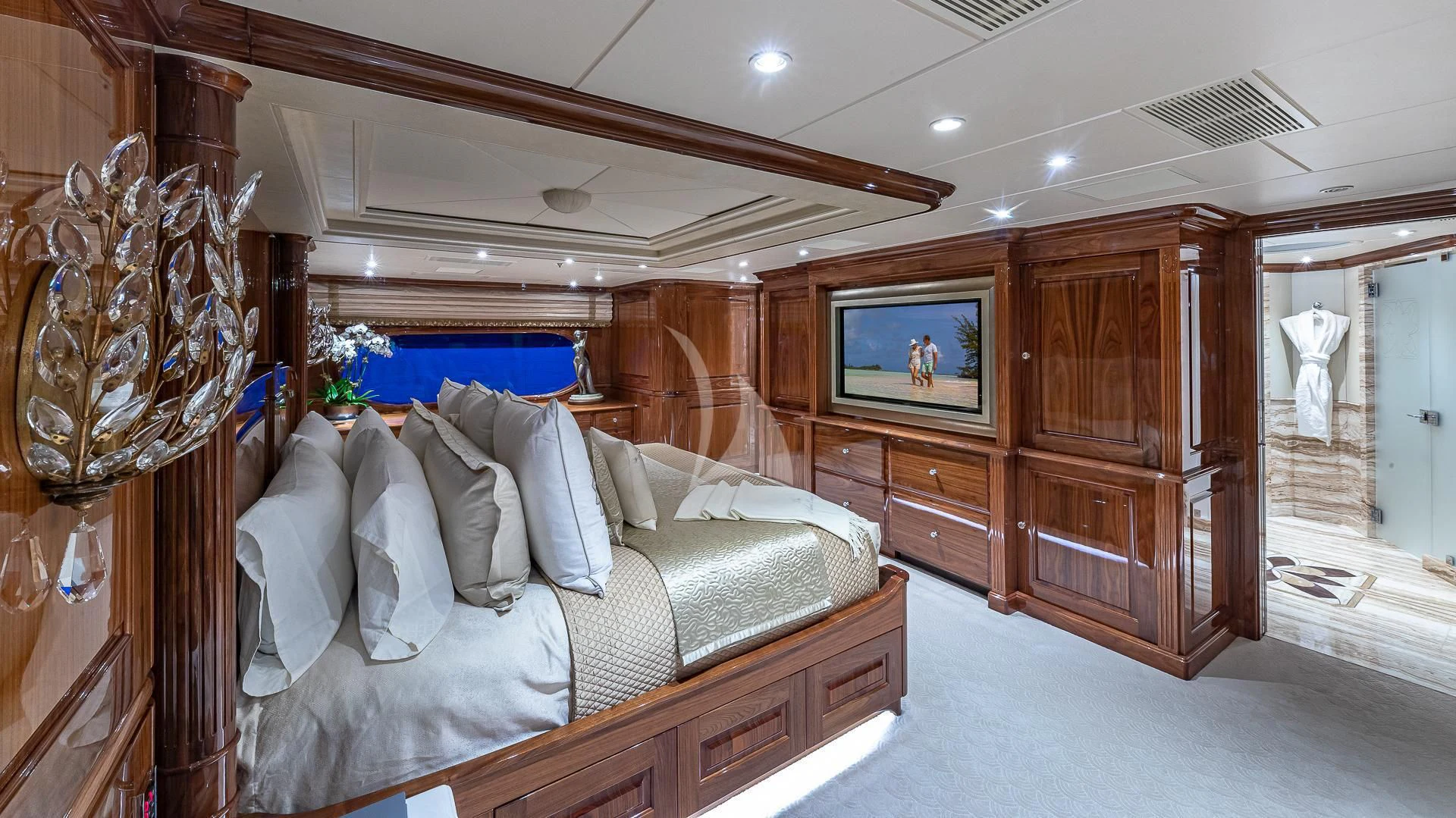 a bedroom with a large bed aboard SILVER LINING Yacht for Sale