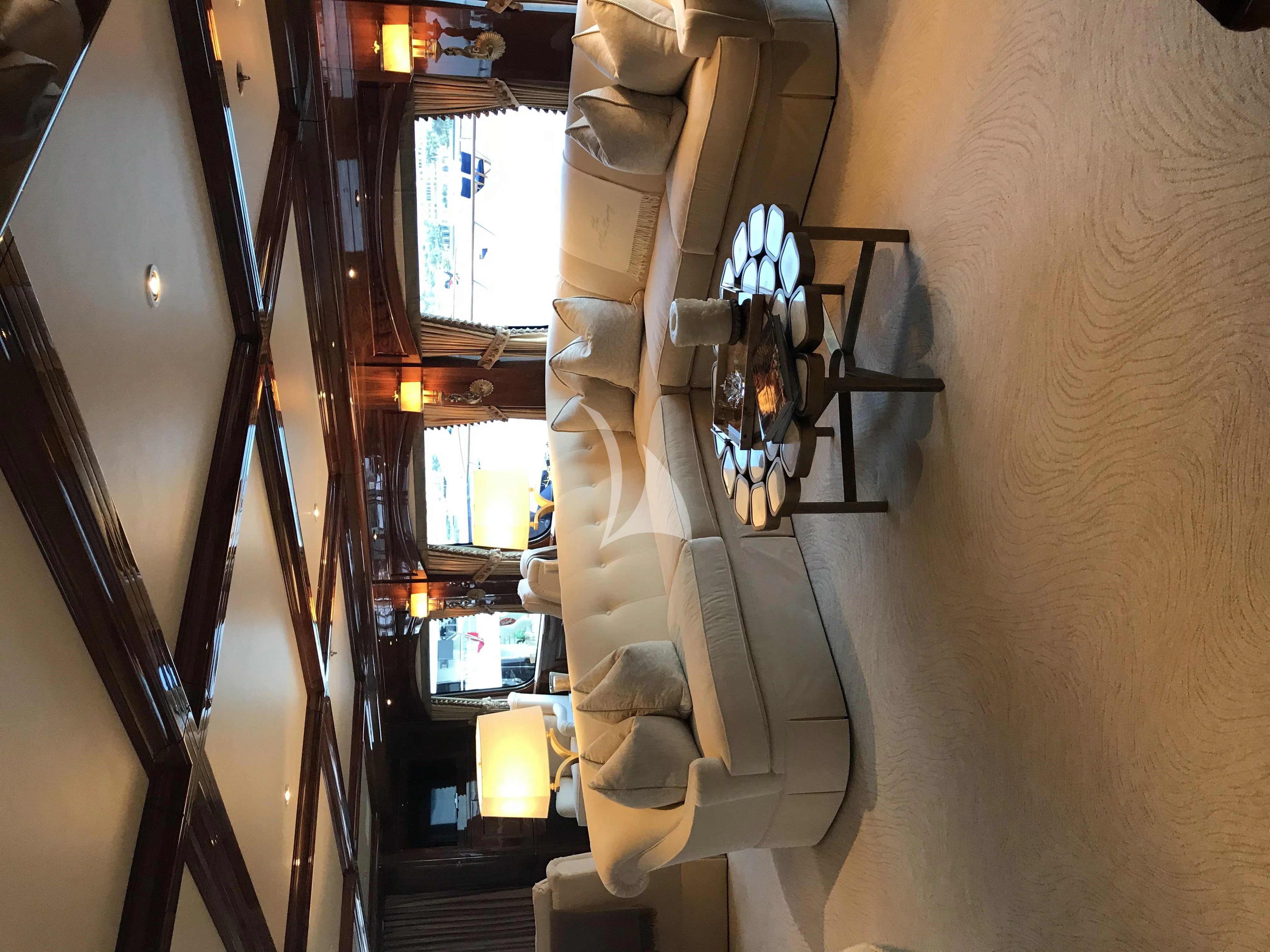 a wall with a chandelier and a cross on it aboard SILVER LINING Yacht for Sale