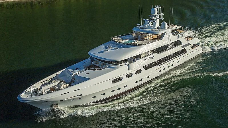 a large ship on the water aboard SILVER LINING Yacht for Sale