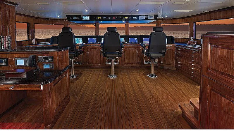 a room with a desk and chairs aboard SILVER LINING Yacht for Sale