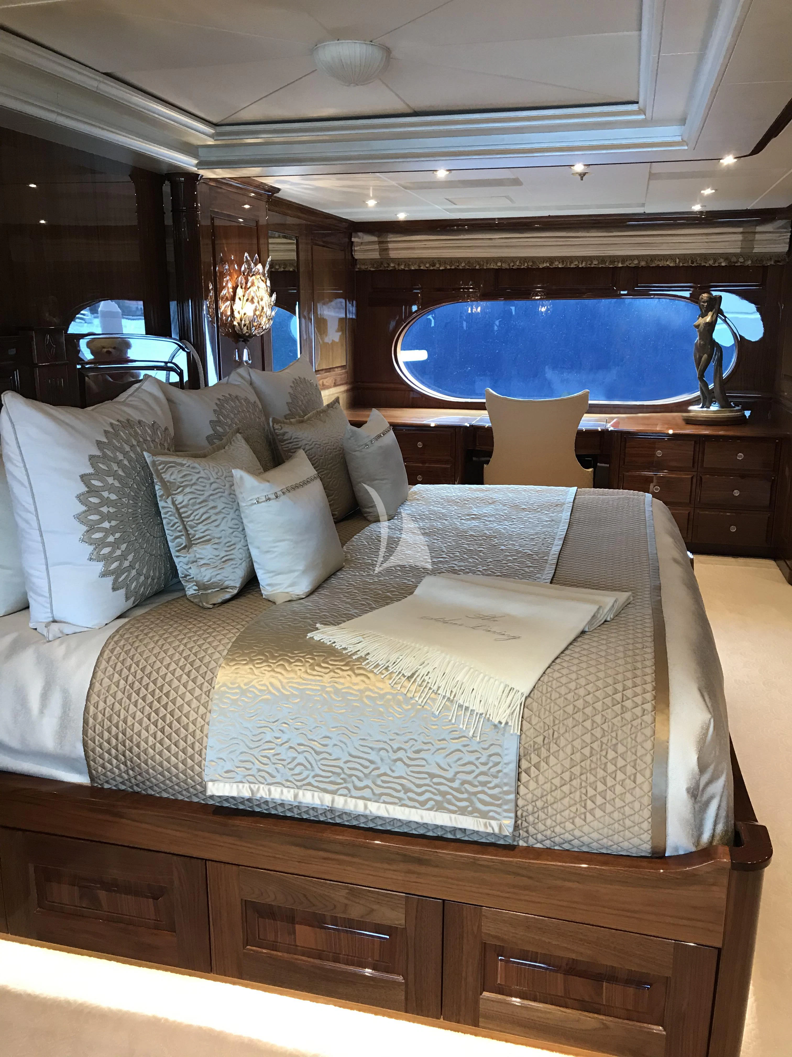 a bed with a large bed aboard SILVER LINING Yacht for Sale