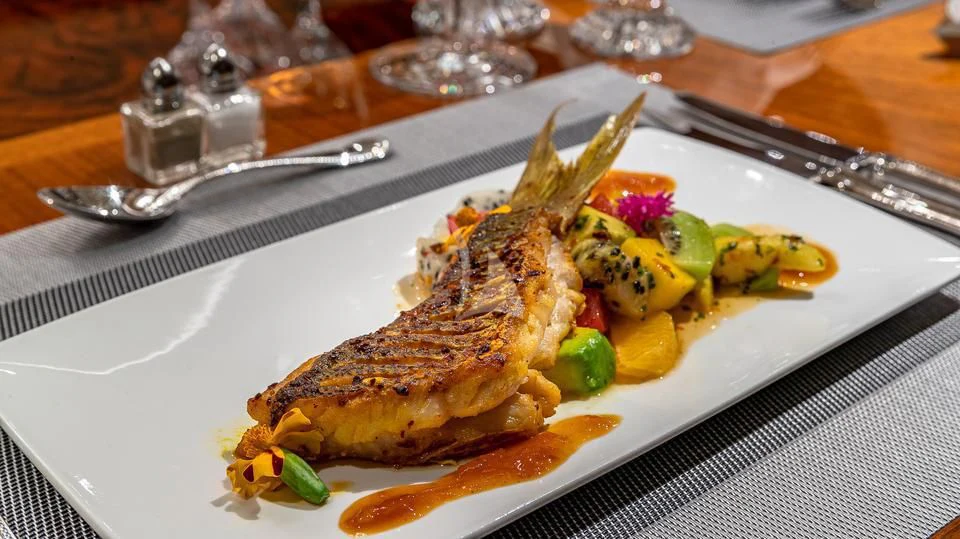 a plate of food aboard SILVER LINING Yacht for Sale