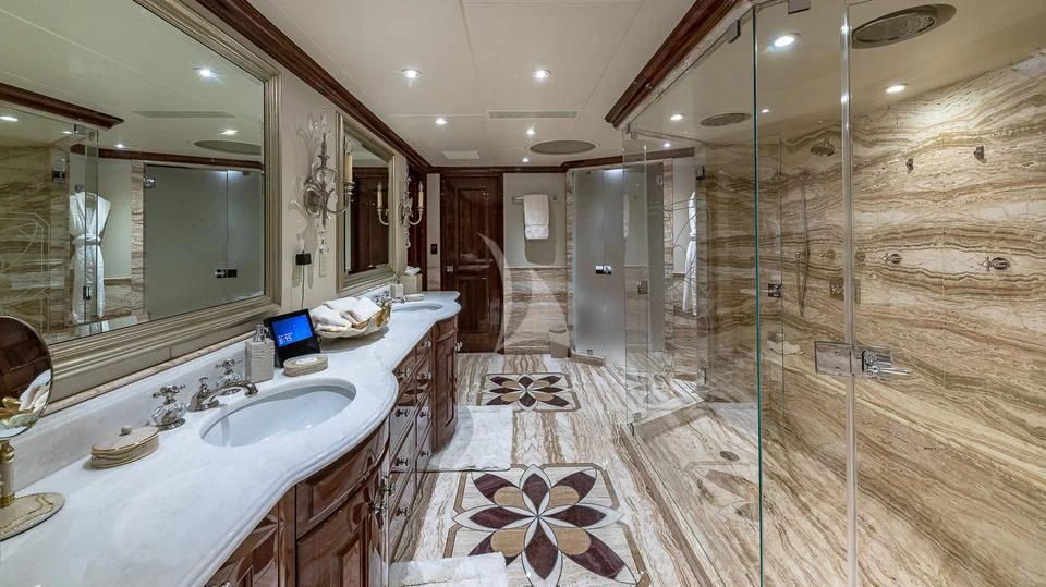 a bathroom with a large shower aboard SILVER LINING Yacht for Sale