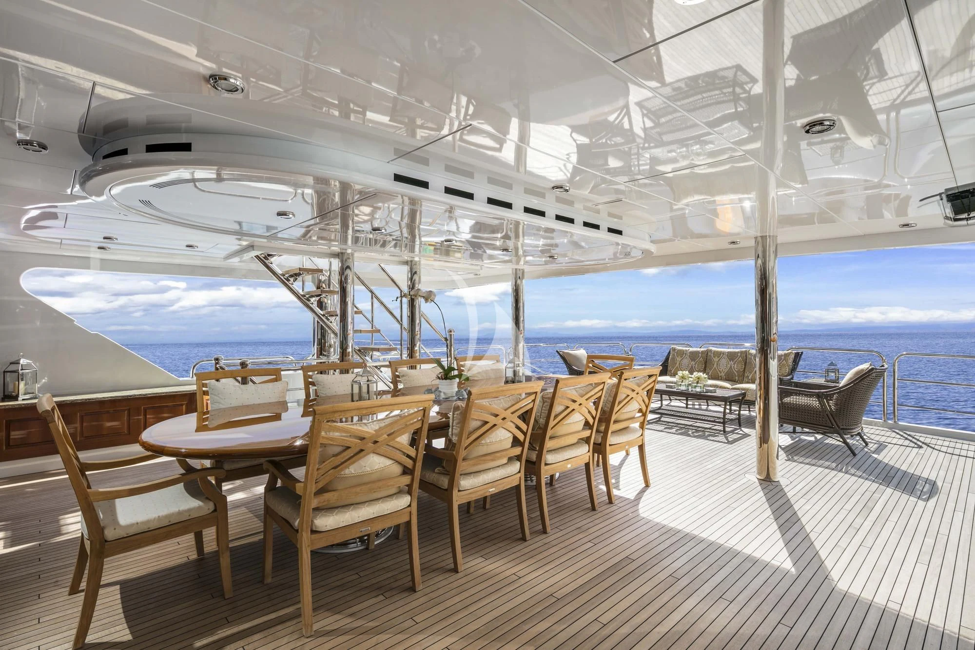 a room with tables and chairs aboard SILVER LINING Yacht for Sale