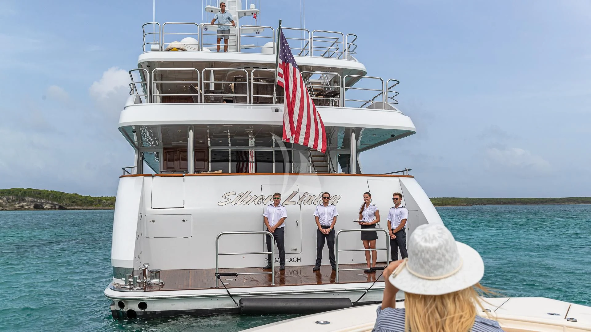 a group of people on a boat aboard SILVER LINING Yacht for Sale