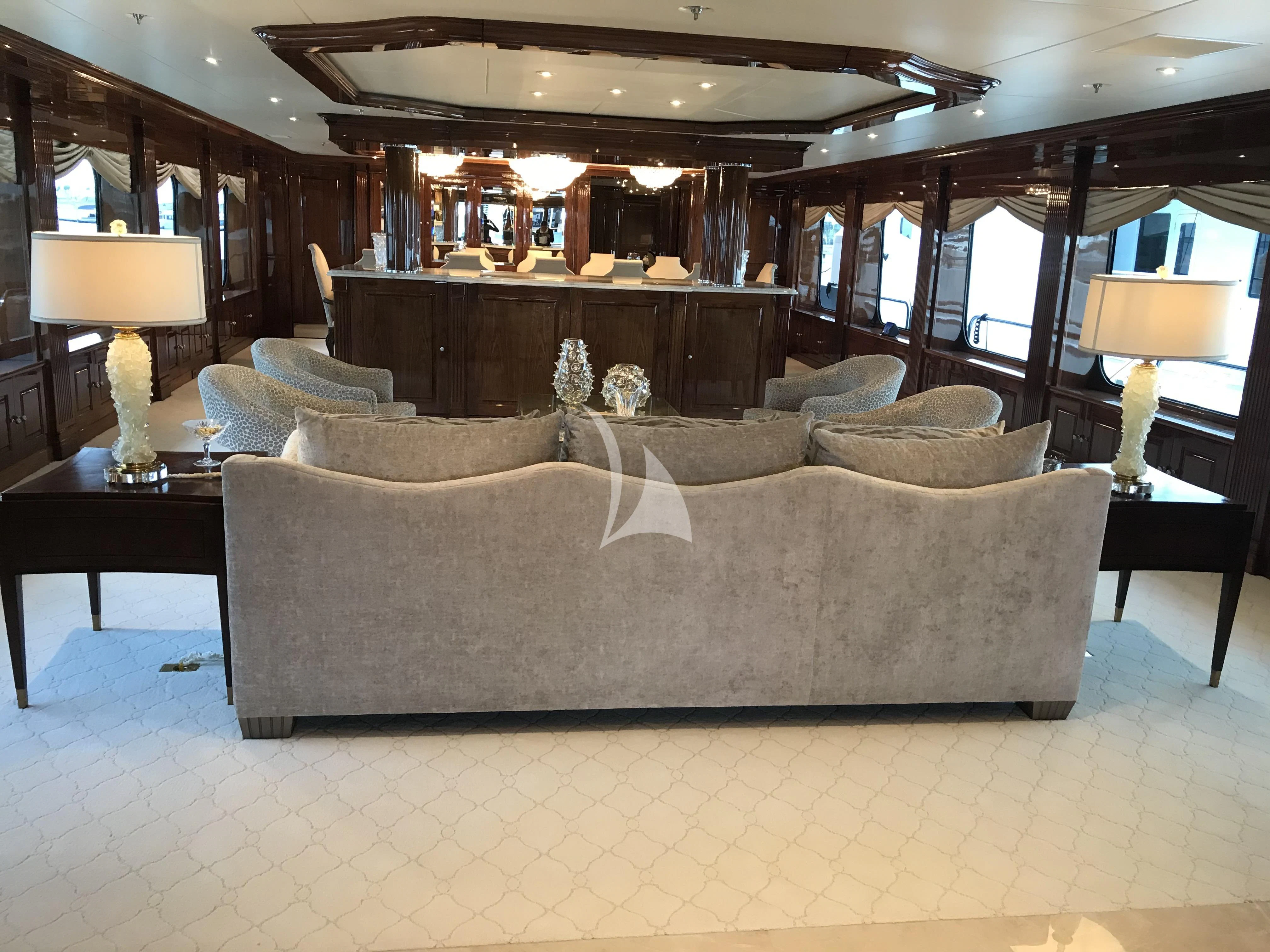 a large living room with a piano aboard SILVER LINING Yacht for Sale