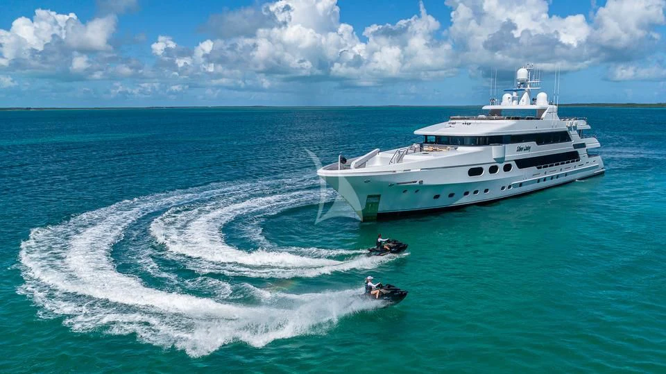 a boat on the water aboard SILVER LINING Yacht for Sale