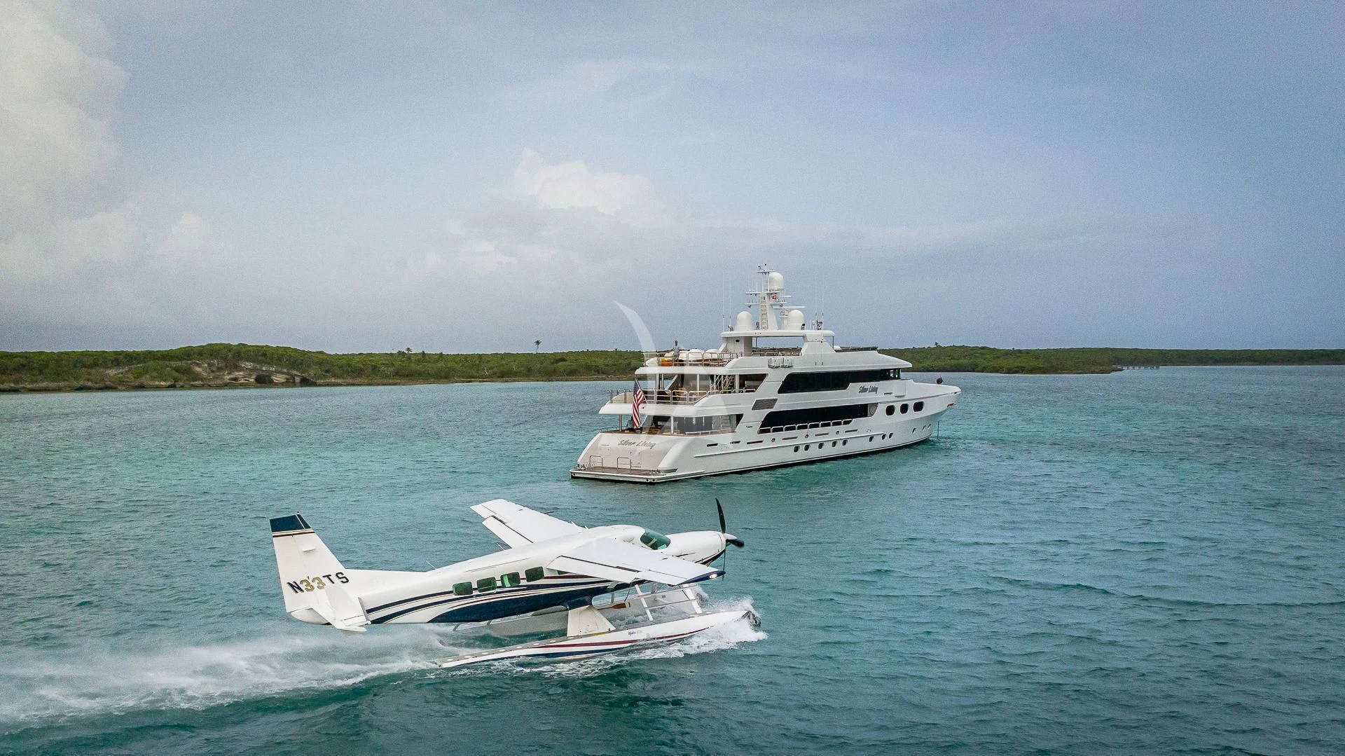 a boat and a boat in the water aboard SILVER LINING Yacht for Sale