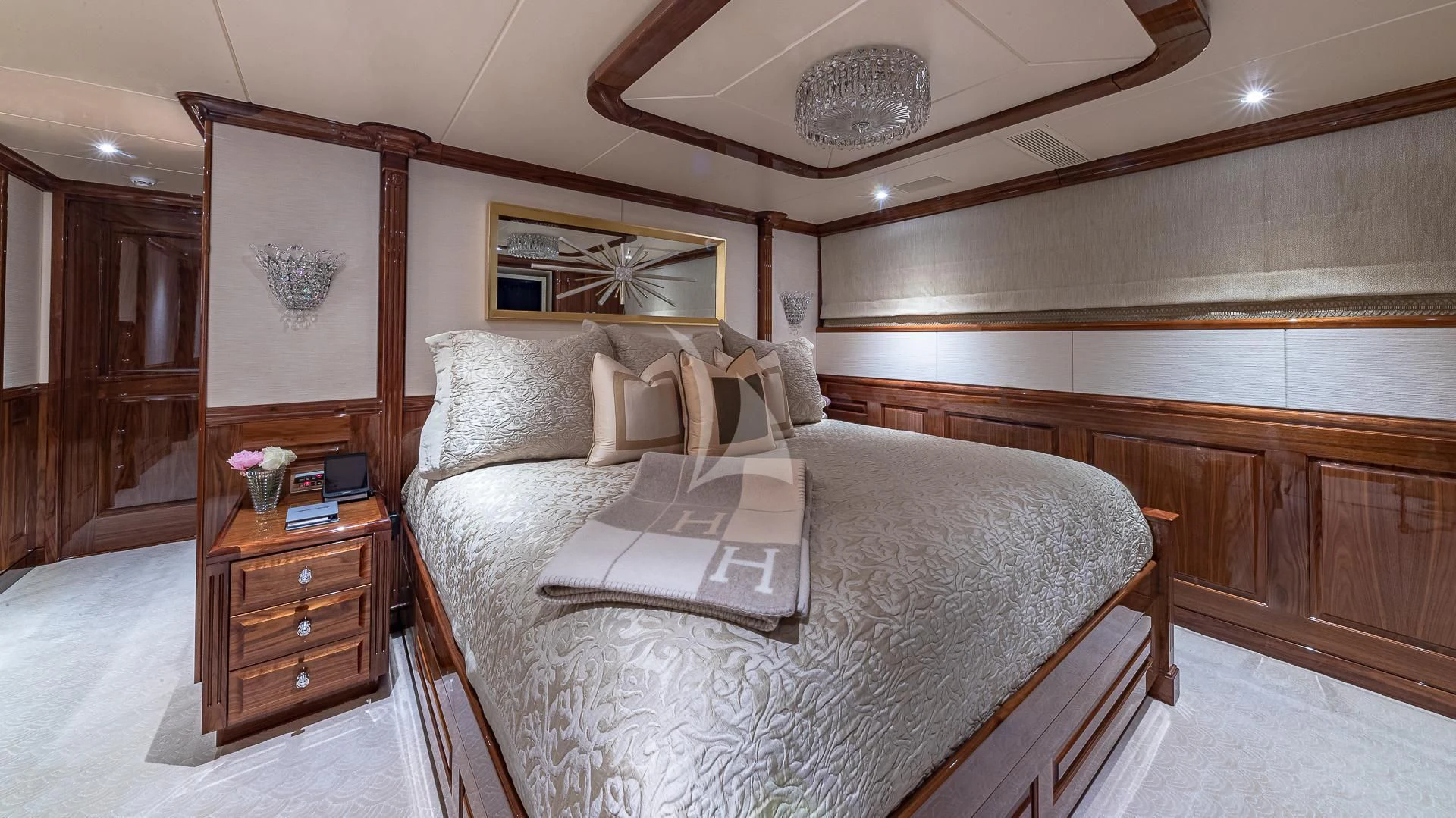 a bed with a white pillow aboard SILVER LINING Yacht for Sale