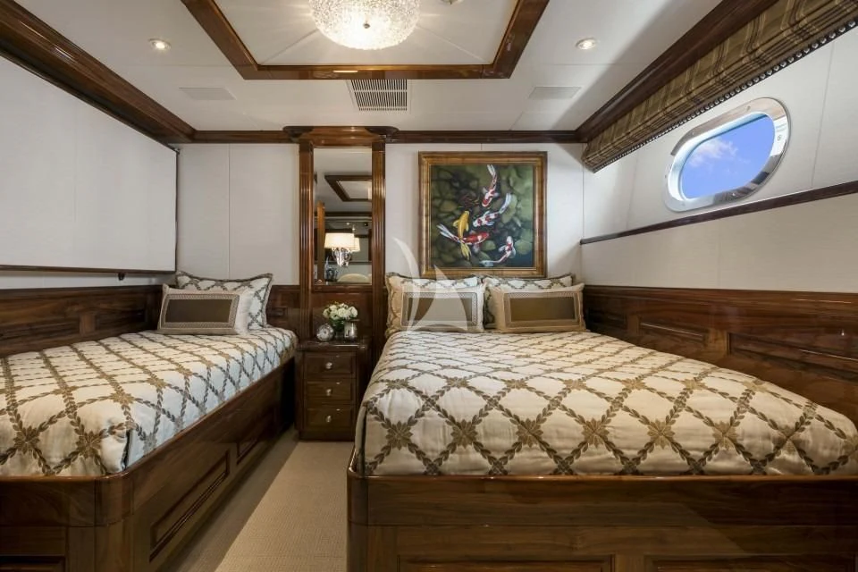 a room with two beds aboard SILVER LINING Yacht for Sale
