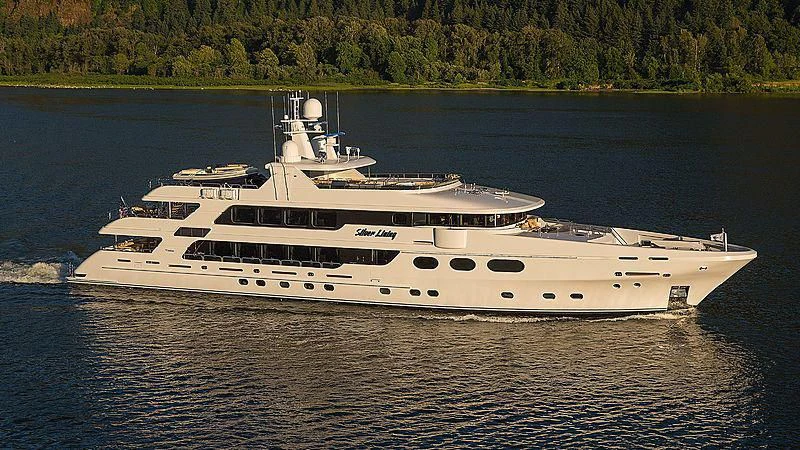 a large white boat on the water aboard SILVER LINING Yacht for Sale