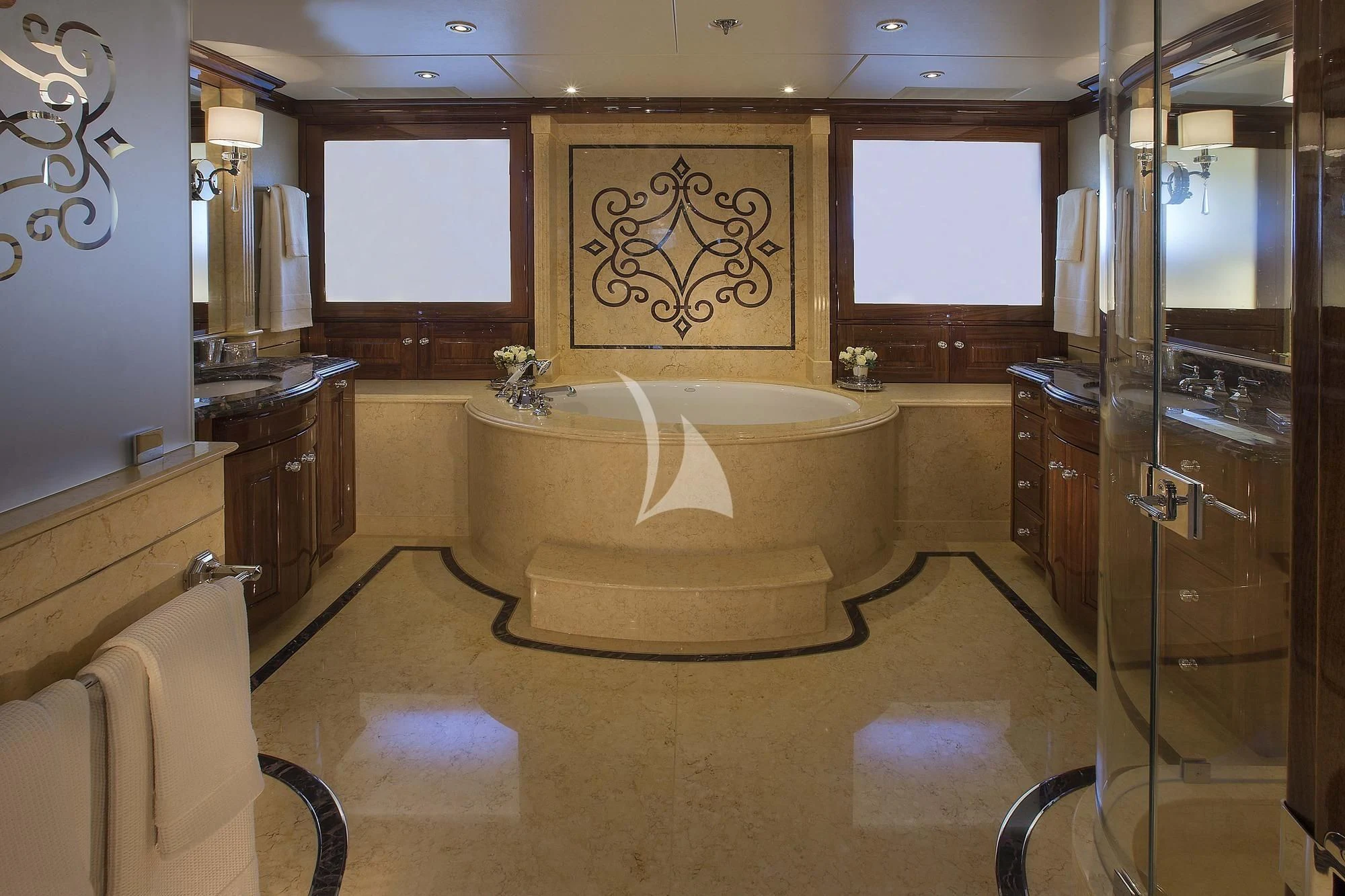 a bathroom with a bathtub and sinks aboard SILVER LINING Yacht for Sale