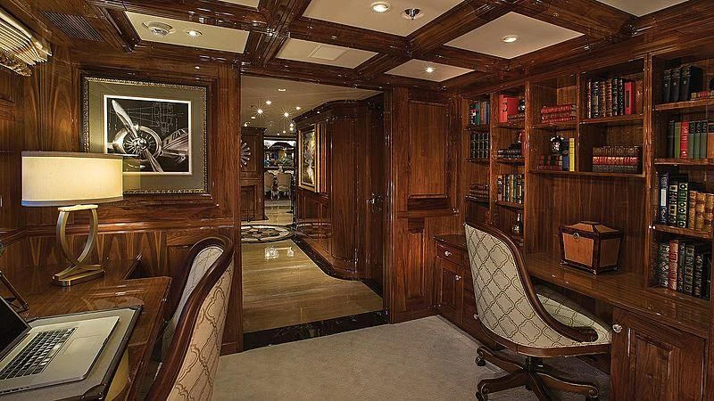 a room with a desk and a computer aboard SILVER LINING Yacht for Sale