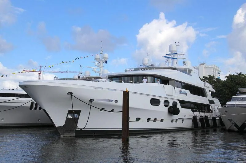 a large white yacht aboard SILVER LINING Yacht for Sale