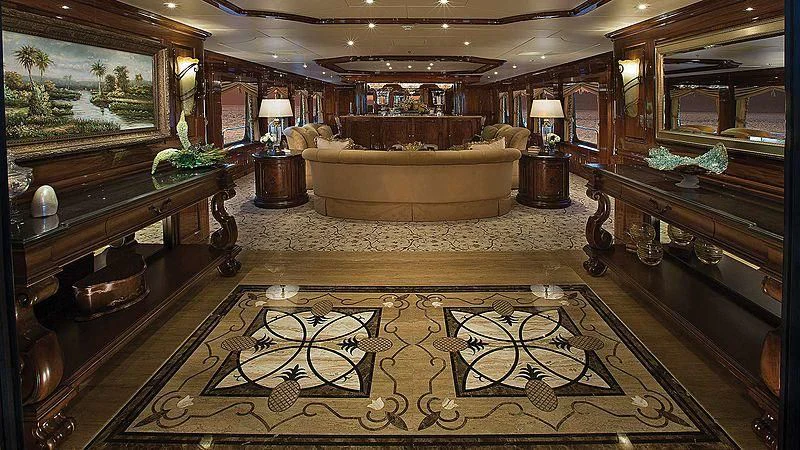 a large living room with a large rug aboard SILVER LINING Yacht for Sale