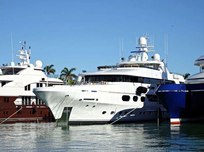 a few large boats in the water aboard SILVER LINING Yacht for Sale