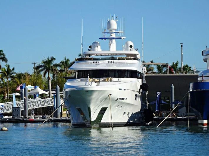 a boat docked at a pier aboard SILVER LINING Yacht for Sale