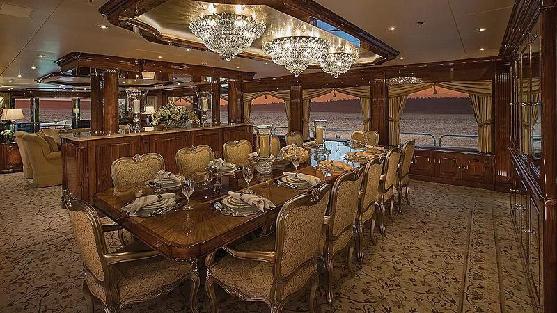 a dining room with a table set aboard SILVER LINING Yacht for Sale