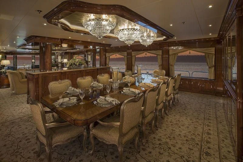 a dining room with a table set aboard SILVER LINING Yacht for Sale