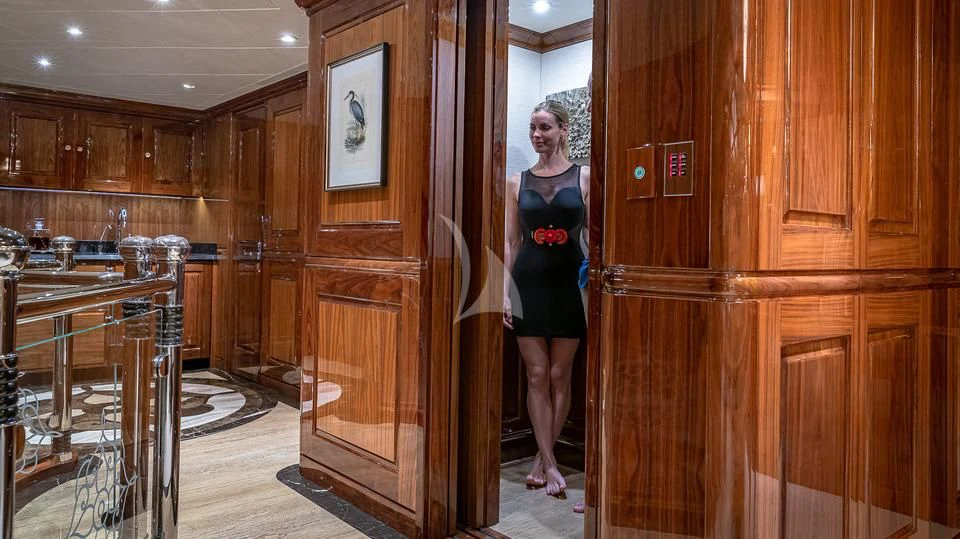 a person standing in a room aboard SILVER LINING Yacht for Sale