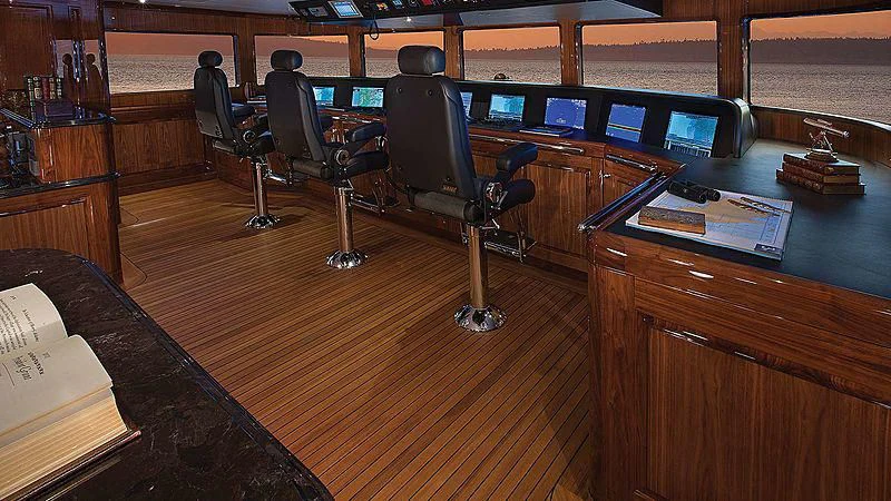 a room with computers and chairs aboard SILVER LINING Yacht for Sale