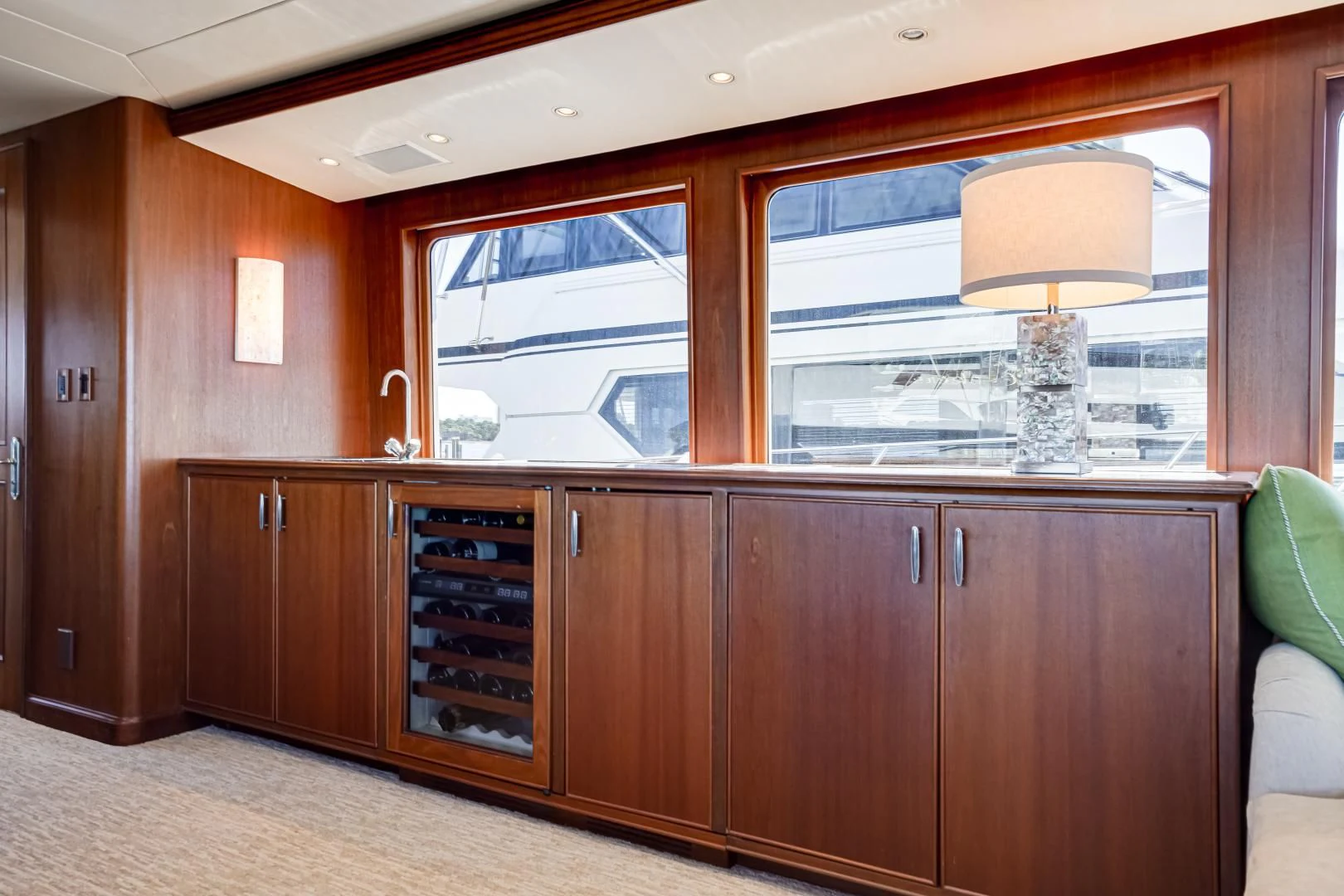 a kitchen with a large window aboard CHECKERS Yacht for Sale