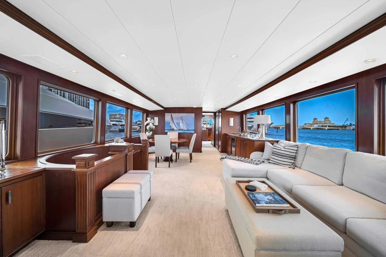a living room with a large window aboard CHECKERS Yacht for Sale