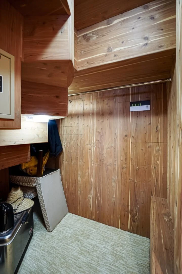 a wood wall with a computer on it aboard CHECKERS Yacht for Sale