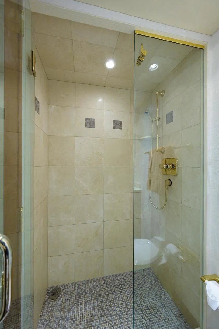 a shower with a shower unit aboard CHECKERS Yacht for Sale