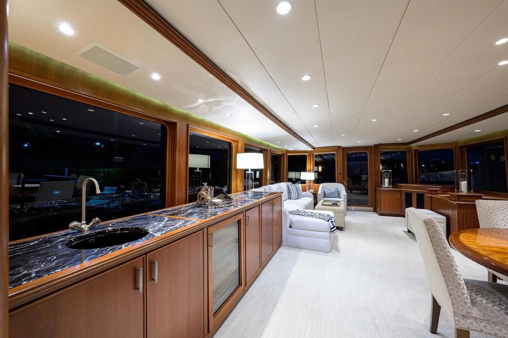 a large kitchen with a large island aboard CHECKERS Yacht for Sale