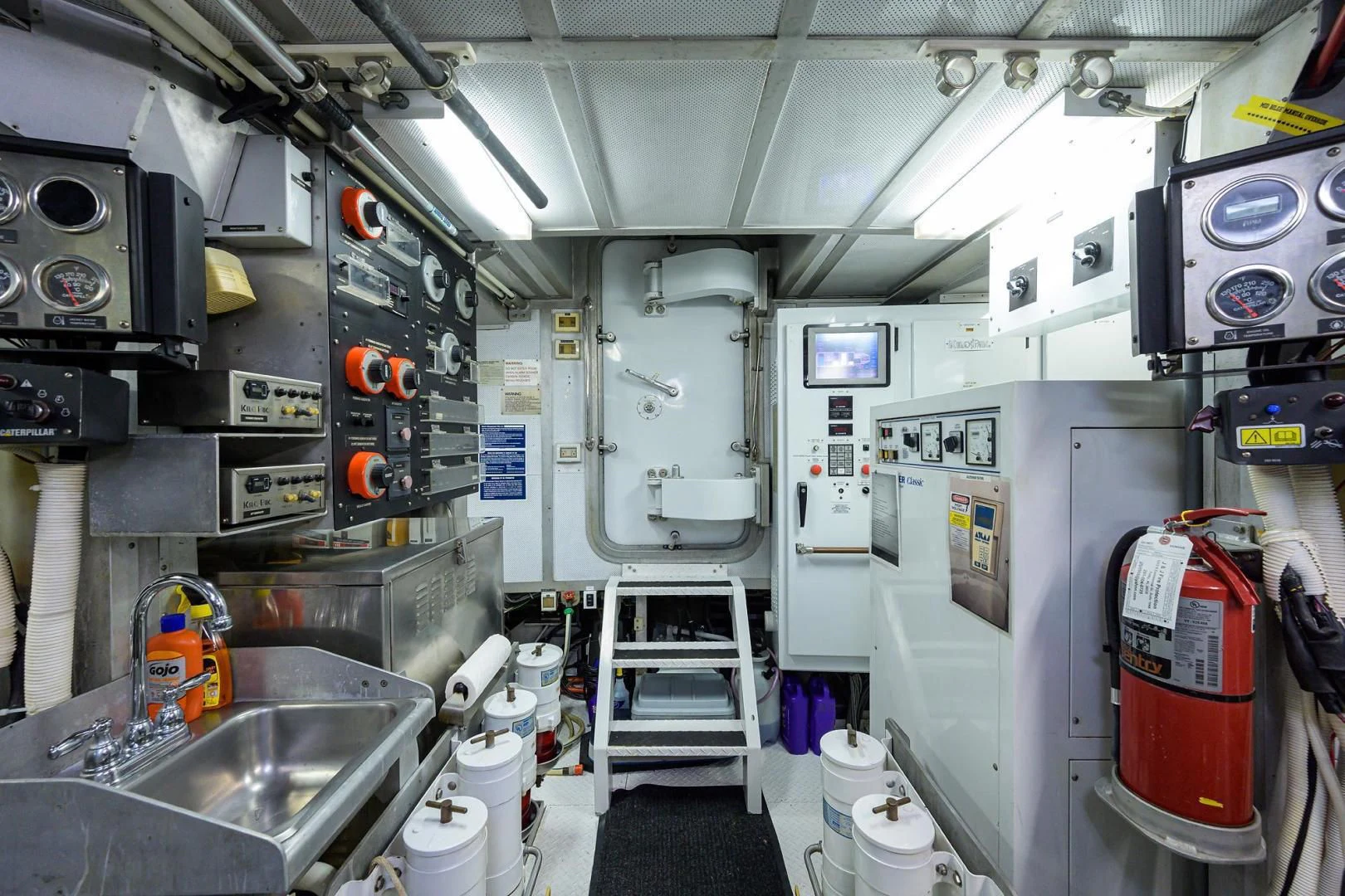a room with machinery aboard CHECKERS Yacht for Sale