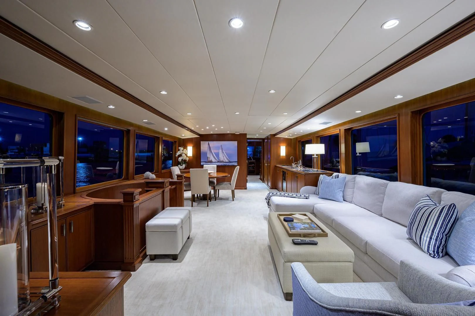 a room with a couch and a television aboard CHECKERS Yacht for Sale