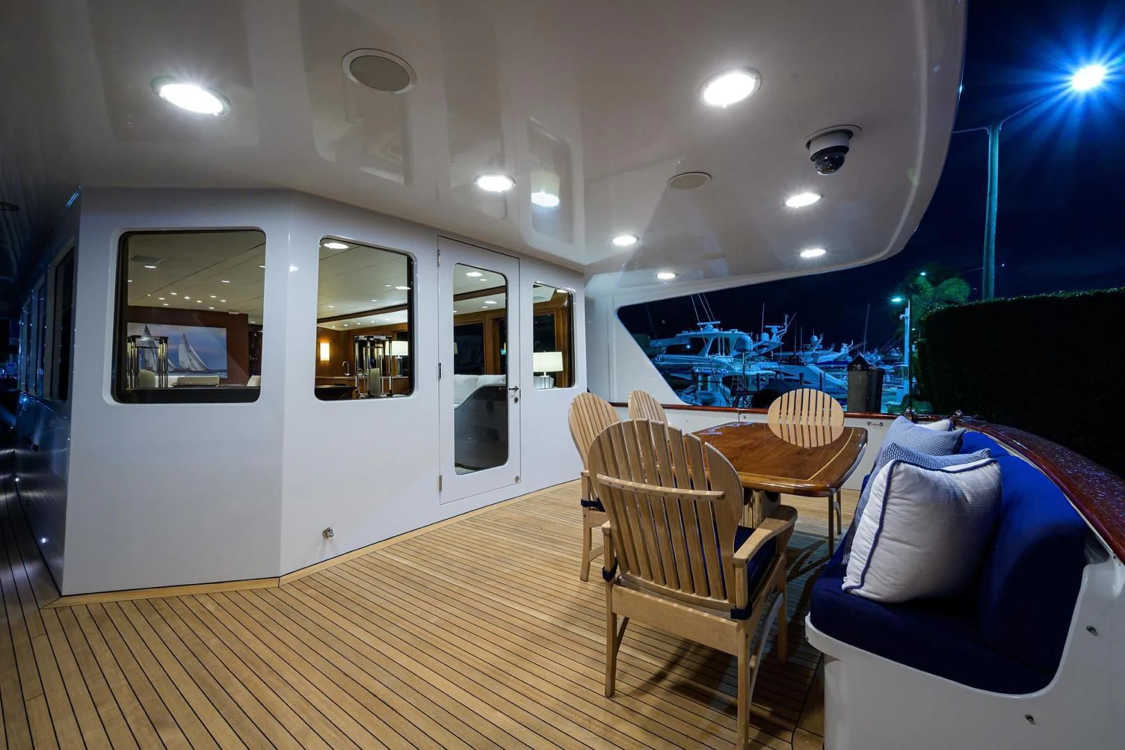 a room with a table and chairs aboard CHECKERS Yacht for Sale